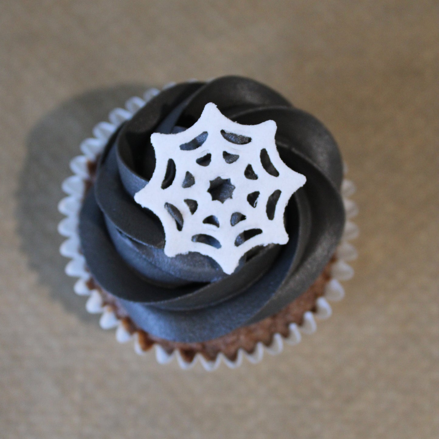 Cobweb Curse Cupcake